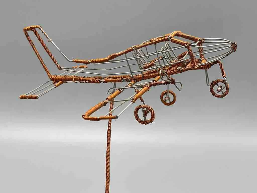 African Recycled Copper Wire Toy Airplane in Flight - Niger