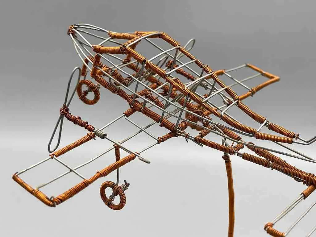 African Recycled Copper Wire Toy Airplane in Flight - Niger