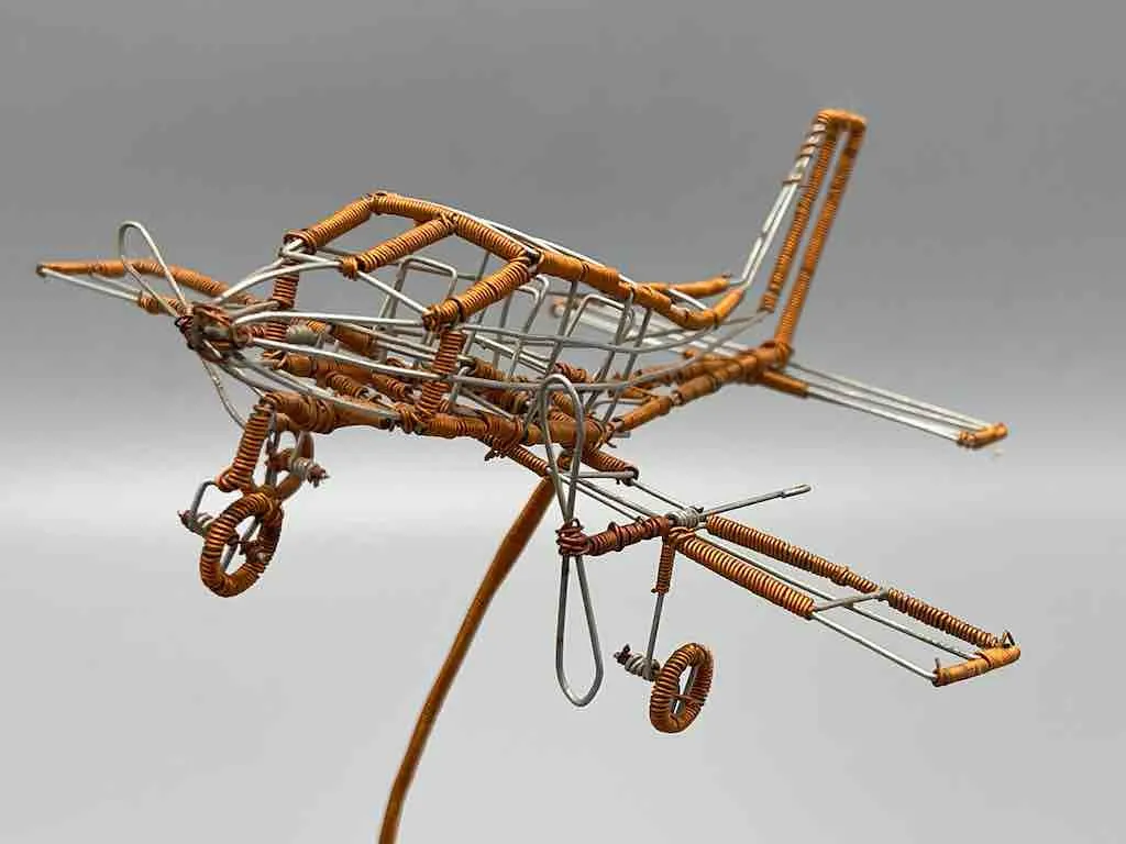 African Recycled Copper Wire Toy Airplane in Flight - Niger