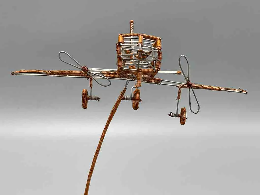 African Recycled Copper Wire Toy Airplane in Flight - Niger