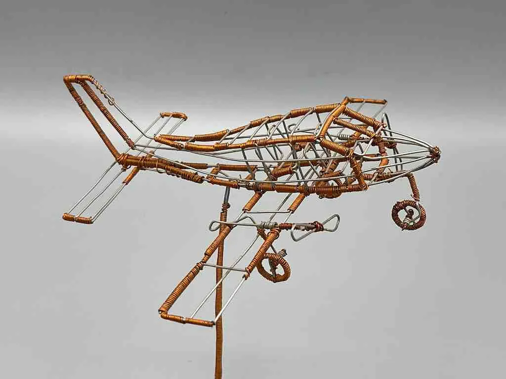 African Recycled Copper Wire Toy Airplane in Flight - Niger